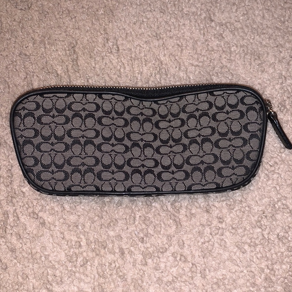 Never used coach cosmetic bag